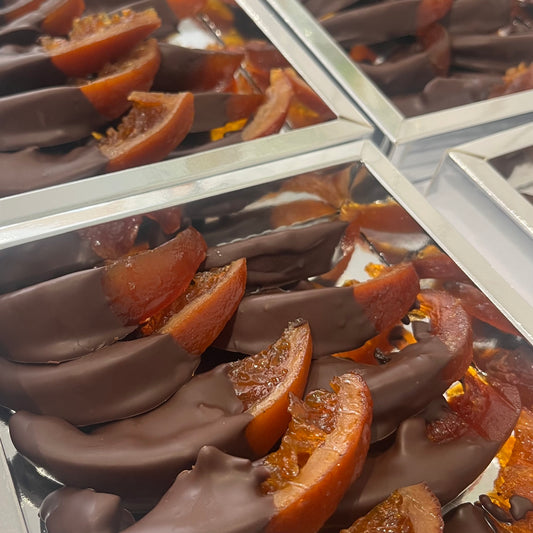 Oranges confites maison enrobées mix chocolat noir et au lait